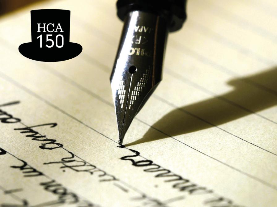 Pen skriver på papir. HCA-logo med sort høj hat med teksten HCA 150.